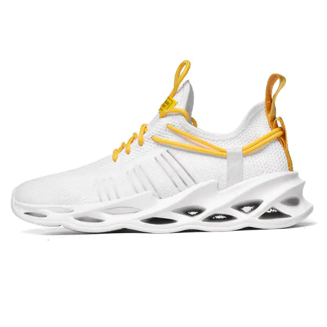 White knit athletic sneaker with yellow laces and pull tabs, featuring a lightweight breathable upper and a sculpted hollow sole.
