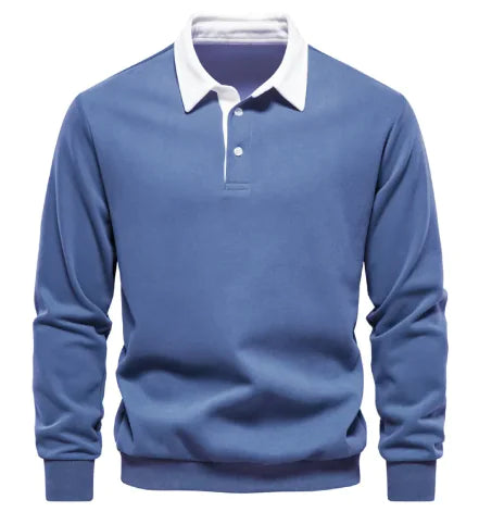 A long-sleeve polo shirt with a white collar and a three-button placket. The fabric appears soft, and the cuffs and hem have a fitted design. The shirt has a classic and stylish look, suitable for both casual and semi-formal wear.