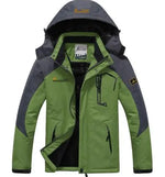 A green and gray outdoor jacket with a hood, multiple zippered pockets, and a logo on the chest and sleeve. The jacket appears to be designed for cold or wet weather, with a waterproof or windproof material.