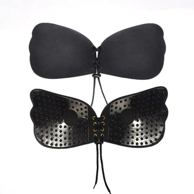 Black adhesive strapless bra with front lace-up closure and wing-shaped cups.
