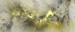 Abstract artwork with smoky gray and black brush strokes over a pale background, with a bright yellow-gold glowing streak across the center.