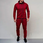 Red men’s hooded tracksuit with zip-up jacket, joggers and ribbed panel detailing.
