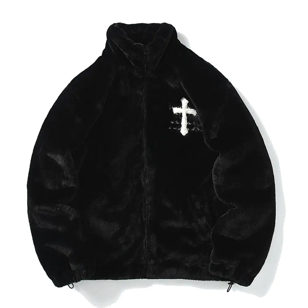 Black fluffy zip-up jacket with high collar, elasticated hem and white cross detail on the chest.
