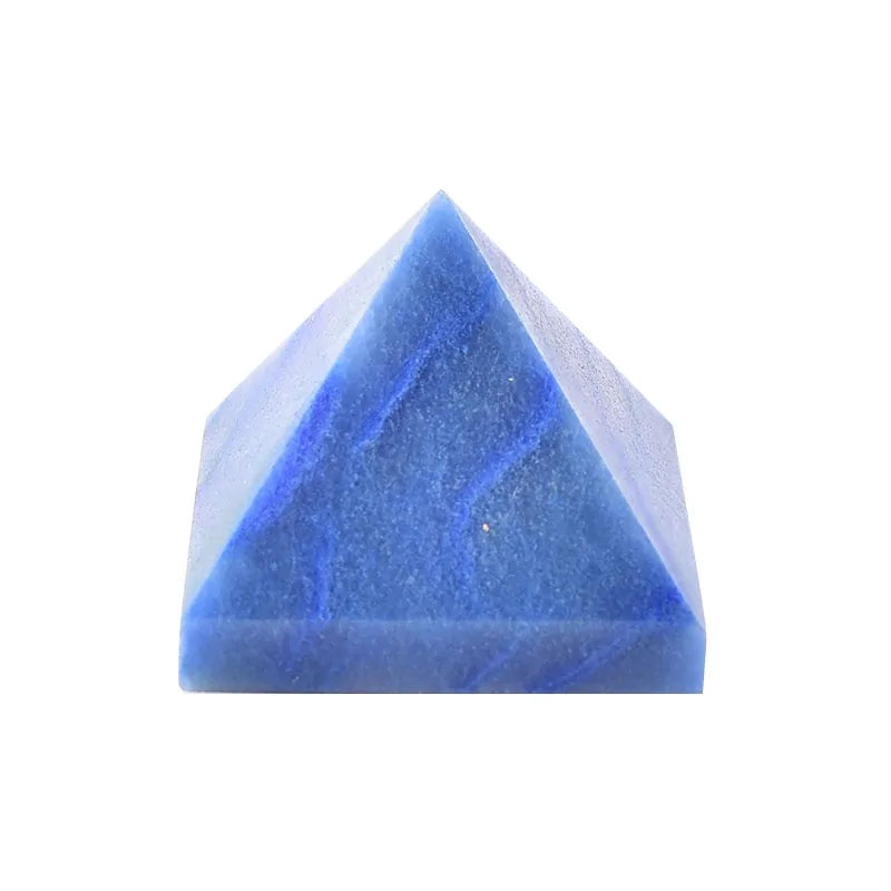Small blue pyramid-shaped crystal or stone with subtle marbled patterns, photographed on a white background.