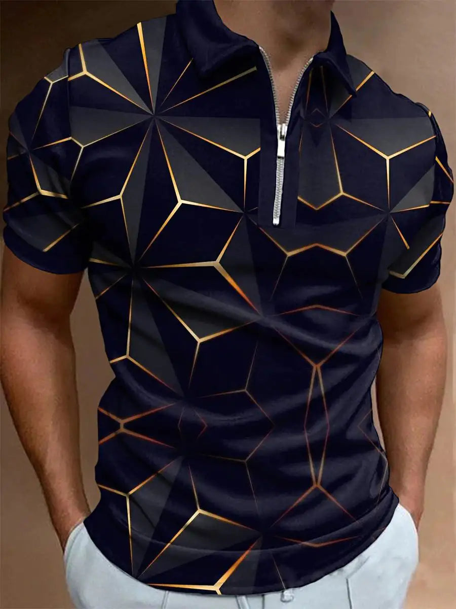 Close-up of a man wearing a dark navy short-sleeve polo with a quarter-zip collar and a geometric pattern of black facets outlined with thin gold lines, paired with light-colored pants.