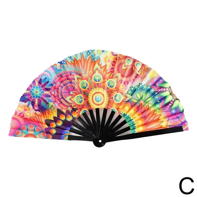 A colorful folding fan with a gradient pattern transitioning from pink to blue to green, with a sparkling effect, and black spokes and handle.