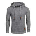 White textured men’s hoodie with drawstrings, ribbed cuffs and small hem patch.
