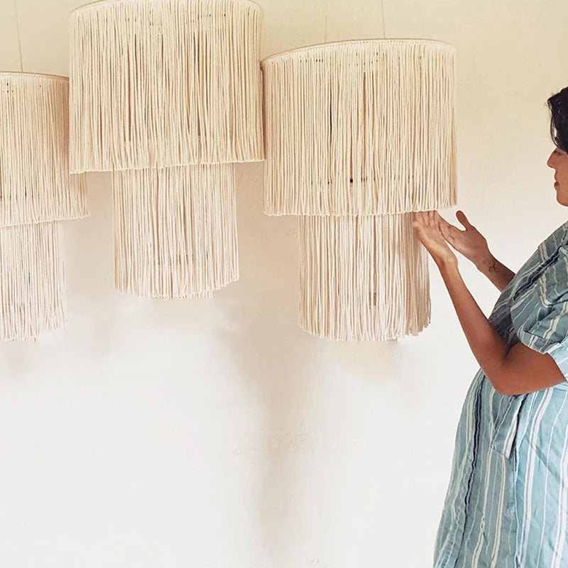 woman checking lamp shade