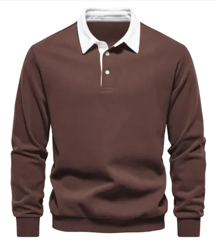 A long-sleeve polo shirt with a white collar and a three-button placket. The fabric appears soft, and the cuffs and hem have a fitted design. The shirt has a classic and stylish look, suitable for both casual and semi-formal wear.