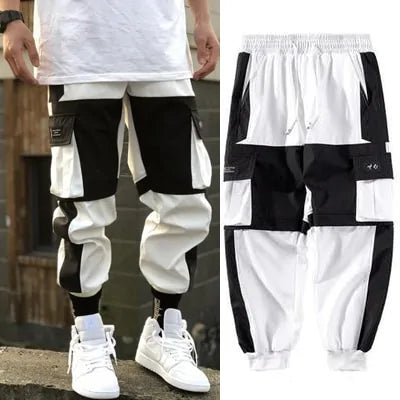 Men’s colour-block cargo joggers with buckle pockets.
