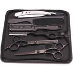 Haircutting tool kit in a zippered case, including two silver hair scissors (one thinning shears), a black comb, and a rainbow-finish straight razor, arranged on a black interior.