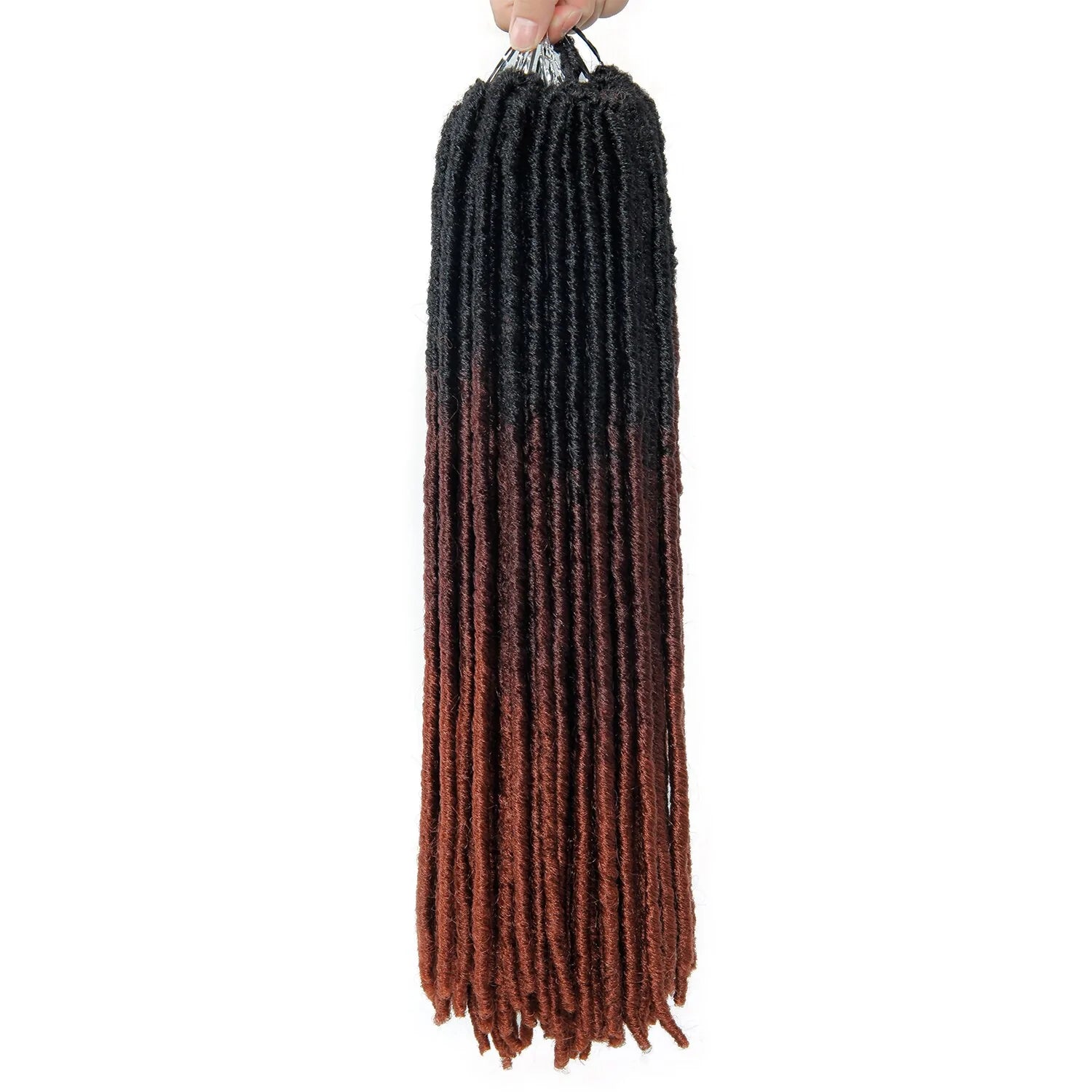 A bundle of long, twisted dreadlock extensions with a dark root color that gradually fades into a brownish, reddish tip, held together by a metallic clip at the top.