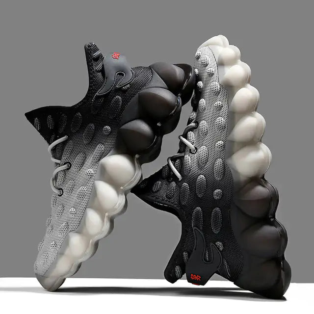 Black and white bubble sole athletic trainers.