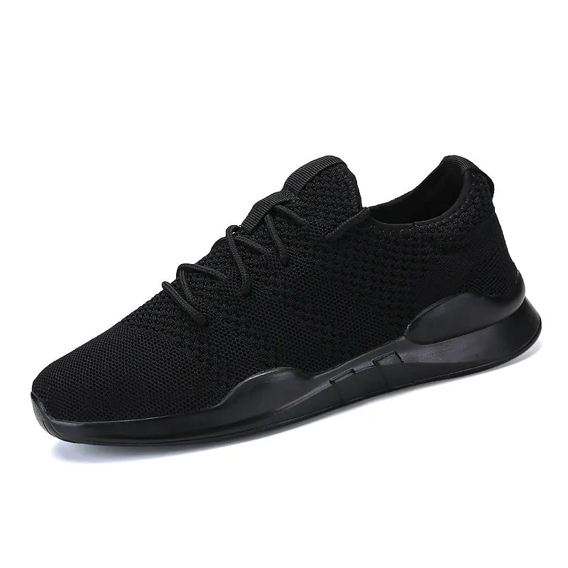 Black knit lace-up trainers with a sleek all-black sole.