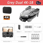 Product collage for a gray foldable drone labeled “Grey Dual 6K-1B,” showing the drone, carrying case, remote controller with phone, battery, spare propellers, charging cable, screwdriver, and protective frames.