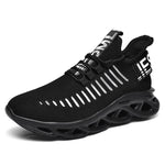 Black athletic sneaker with a breathable knit upper, lace-up front, white striped accents, bold text detailing, and a thick sculpted sole with hollow cutout sections.
