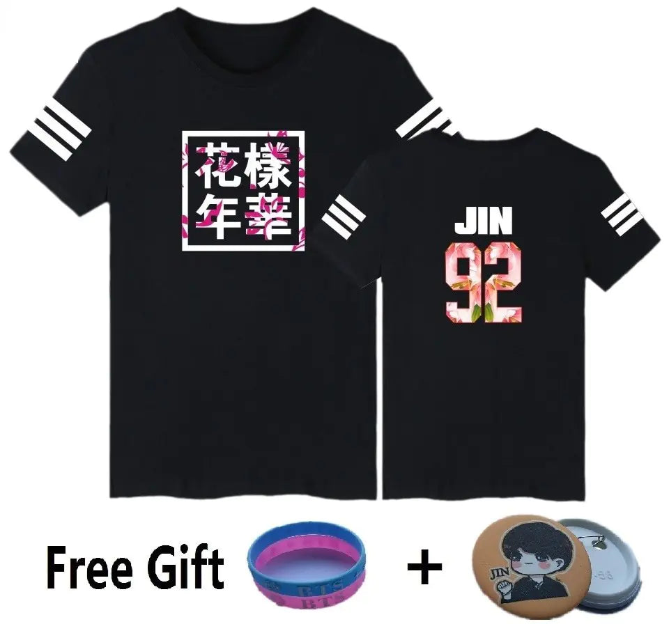 Black graphic T-shirt with free gift accessories.
