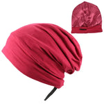 Burgundy satin-lined slouch beanie/sleep cap with an adjustable tie, shown on a white background with a small inset view from the back.