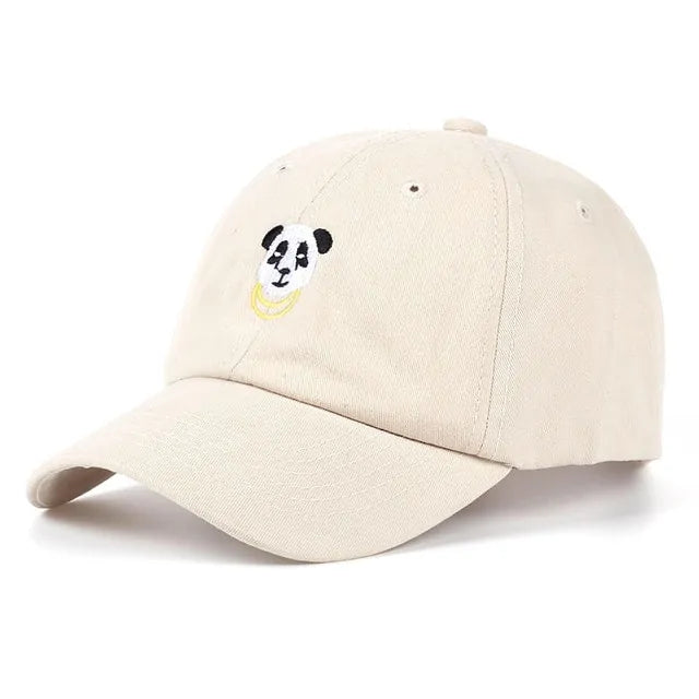 Beige baseball cap with a small embroidered panda face on the front, shown on a white background.