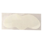 Two white adhesive patches on a beige background