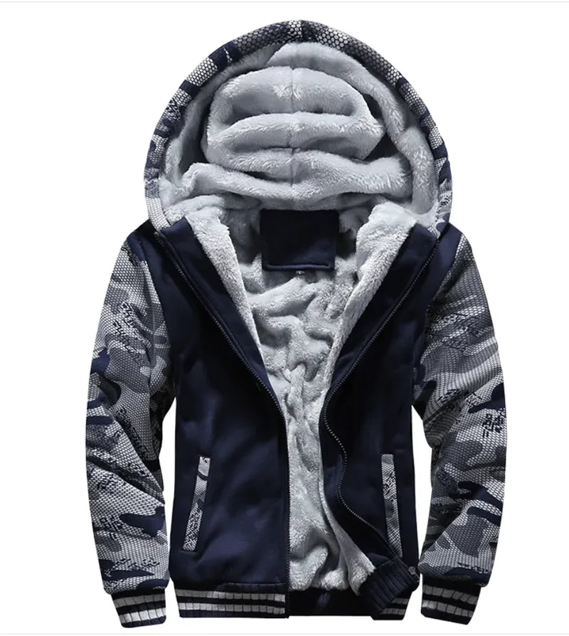 A stylish two-tone hoodie with a navy blue body and red sleeves, featuring a thick, plush gray fleece lining for warmth. The hood is large and lined with the same soft material, and the jacket includes a full-length zipper and two front pockets with red accents. Designed for cold weather comfort.