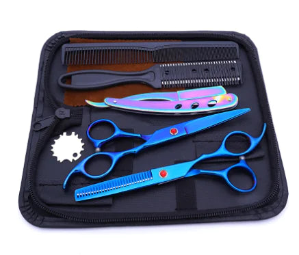 Open black zippered case containing a hair-cutting kit with two blue scissors (one thinning shear), an iridescent straight razor, and two combs arranged in elastic slots.